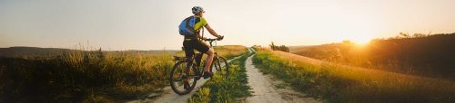 man on bike in an outdoor trail