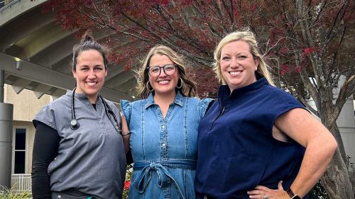 Shea Wagner Garrett, center, is pictured with Lucy Ausdran, Hamilton Medical Center Emergency Department physician assistant; and Becca Allen, Surgical Services clinical manager.