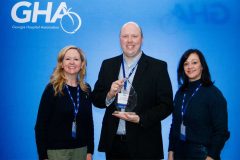 leadership members with award