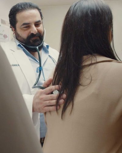 hamilton cardiologist sonny achtchi performs an exam.