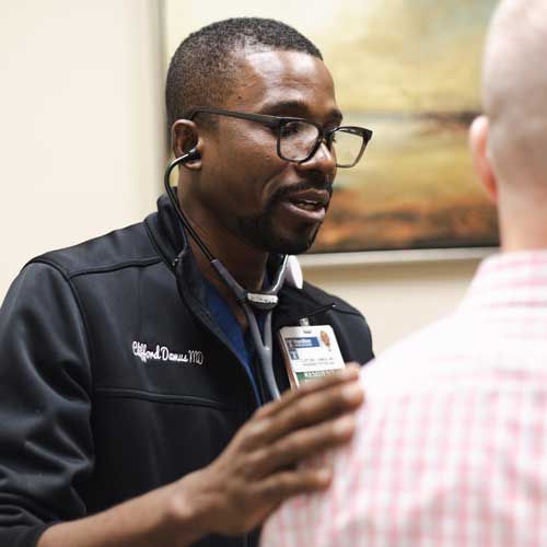 resident physician doing an exam